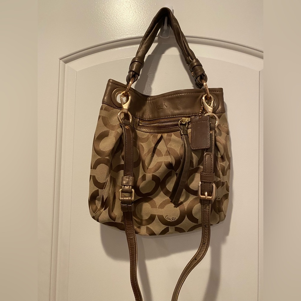 Brown coach purse. Lavender interior